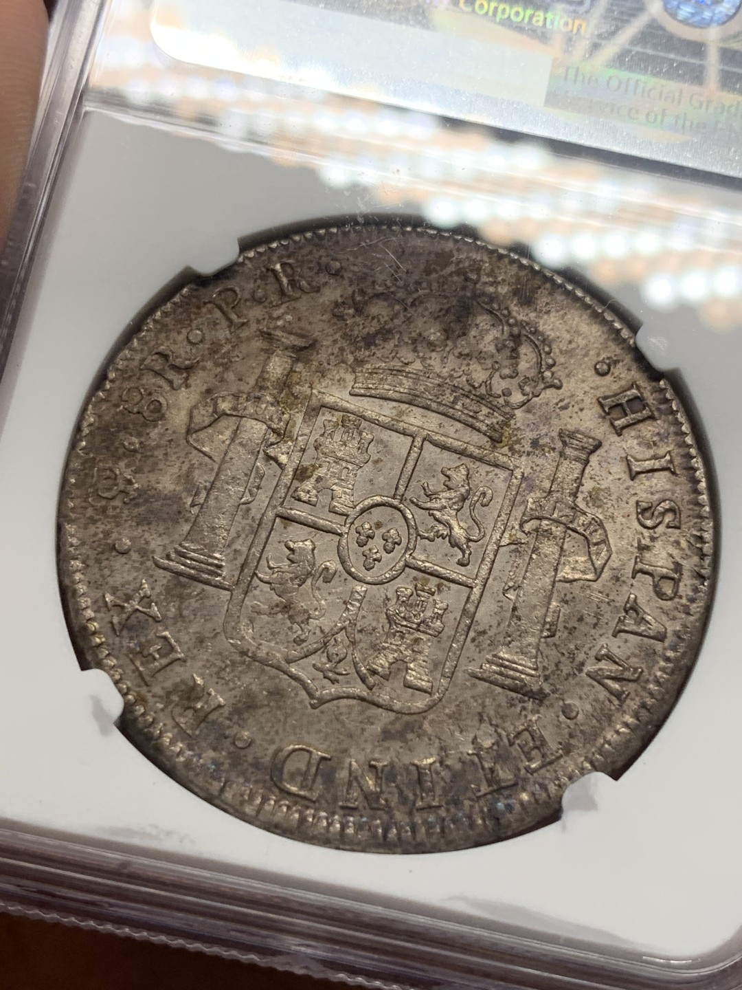 《竞宝斋》第111场-周日，周一 ，2场连拍（全场包邮） NGC UNC 玻利维亚 1787年 卡三 双柱大银币 标签为包浆等同于P97标签，可收藏