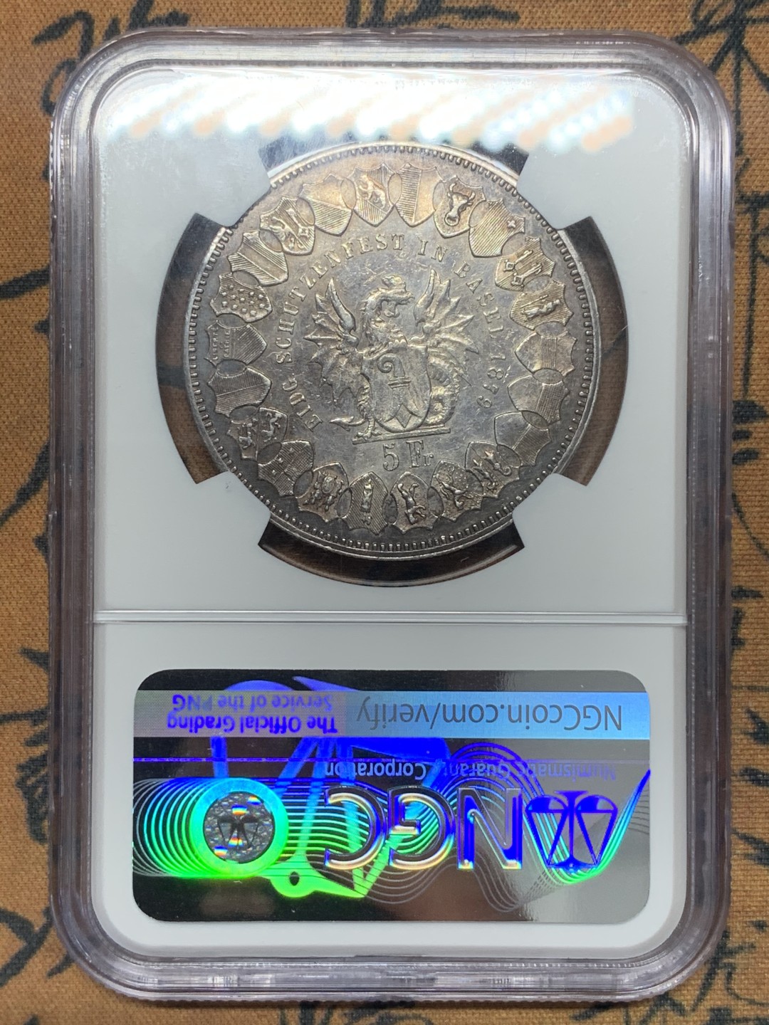 《竞宝斋》第111场-周日，周一 ，2场连拍（全场包邮） NGC AU 1879年瑞士巴塞尔射击节5法郎银币  包浆醇美 几乎也没多少磨损