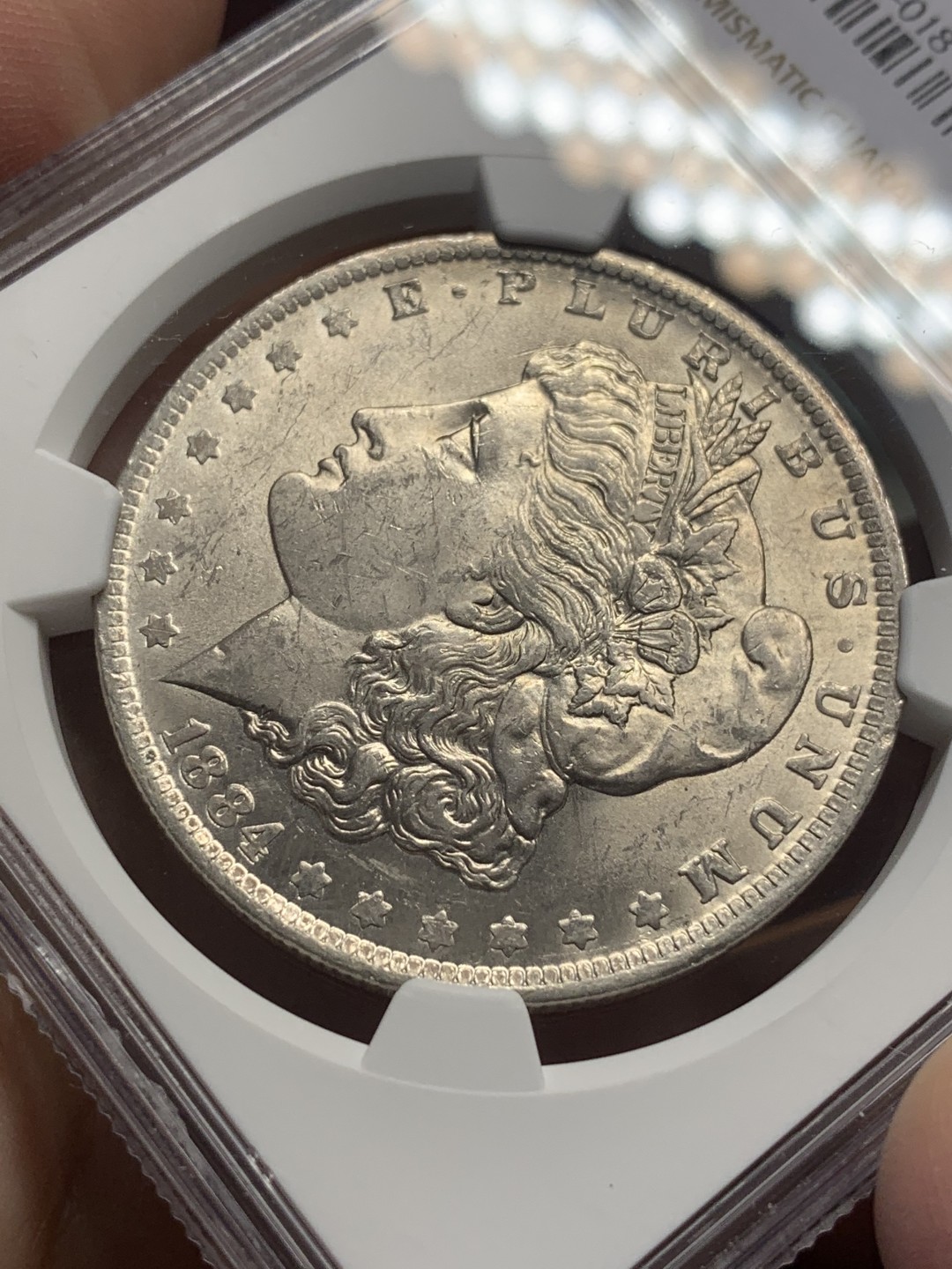 《竞宝斋》第111场-周日，周一 ，2场连拍（全场包邮） NGC-UNC 美国1884-O年 摩根一元大银币 原光好品