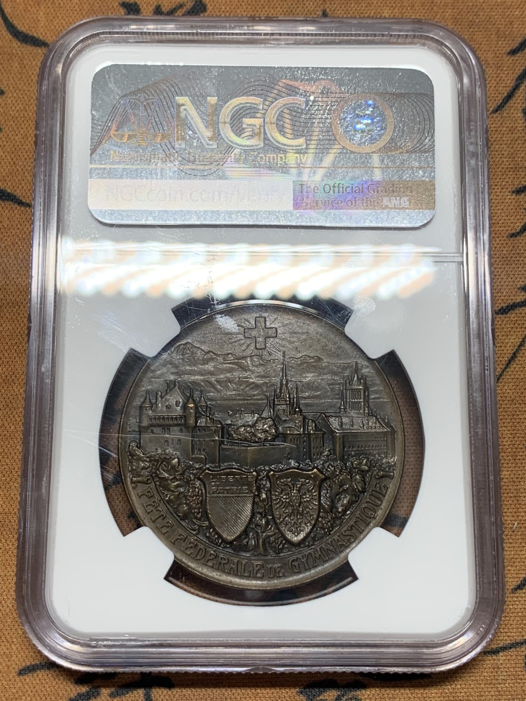 《竞宝斋》第111场-周日，周一 ，2场连拍（全场包邮） NGC MS64  1909年 瑞士洛桑  城市景观铜章 超燃品相