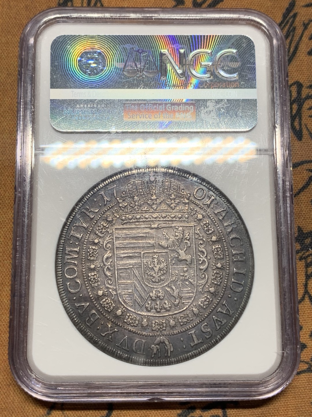 《竞宝斋》第111场-周日，周一 ，2场连拍（全场包邮） NGC-AU58  神圣罗马 帝国 1701年 利奥波德一世 大波浪 猪嘴大泰勒银币 入骨五彩包浆 老味道 非常漂亮