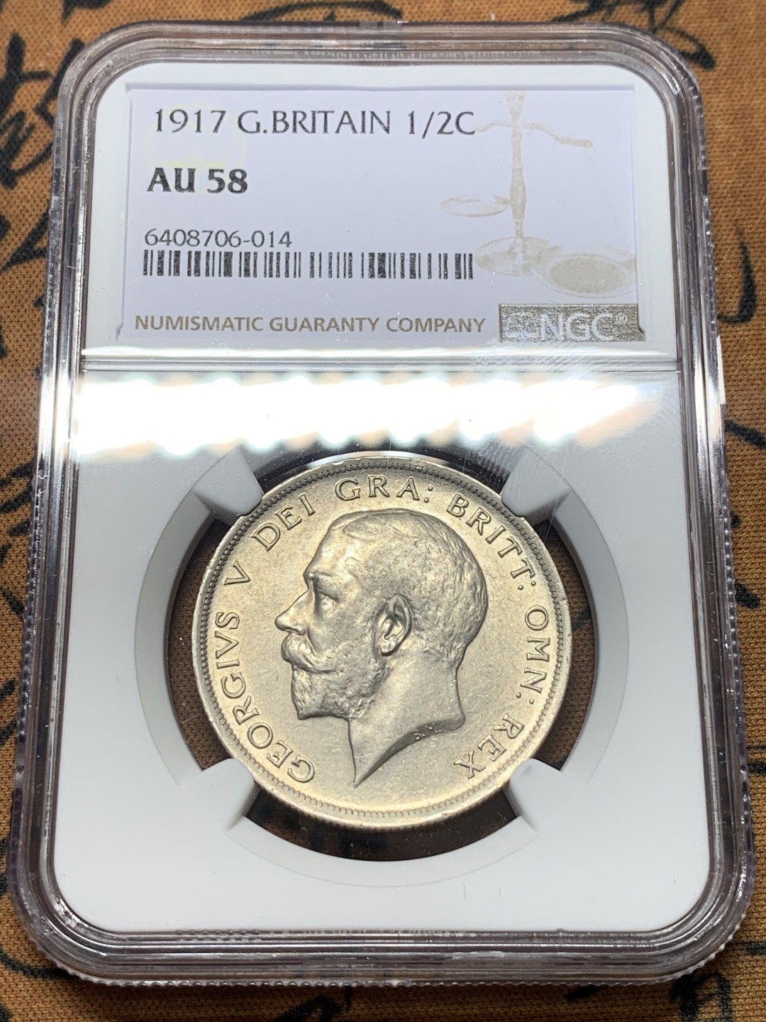 《竞宝斋》第111场-周日，周一 ，2场连拍（全场包邮） NGC-AU58 英国乔五 1917年 1/2克朗银币 比较少见的年份