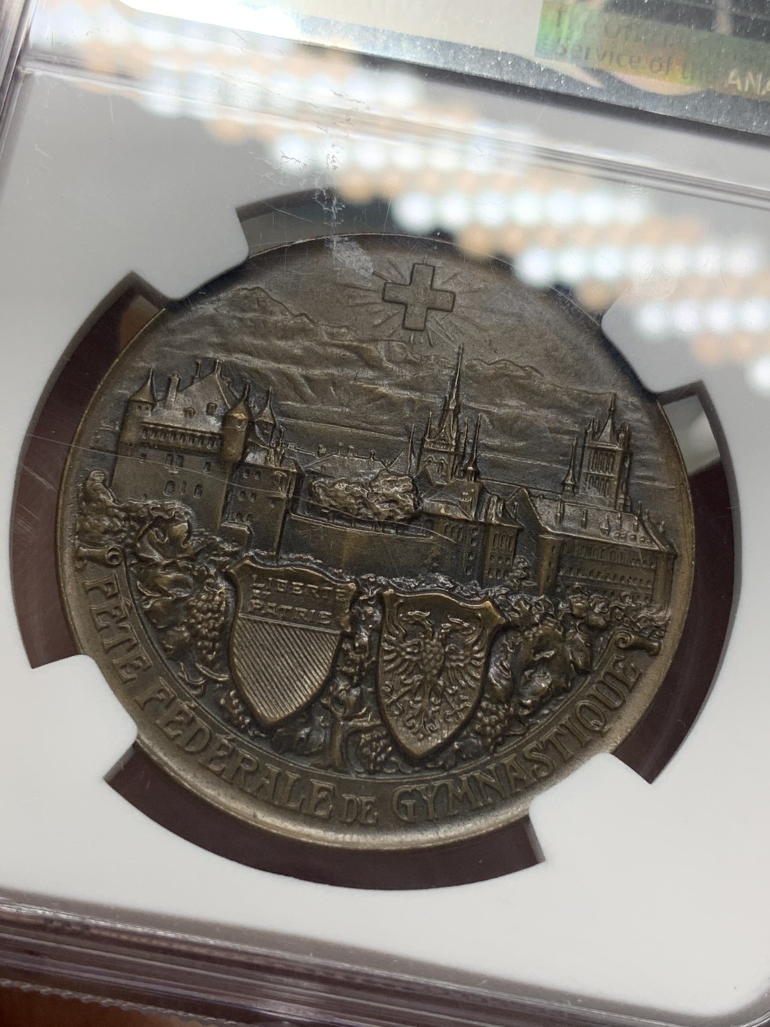 《竞宝斋》第111场-周日，周一 ，2场连拍（全场包邮） NGC MS64  1909年 瑞士洛桑  城市景观铜章 超燃品相