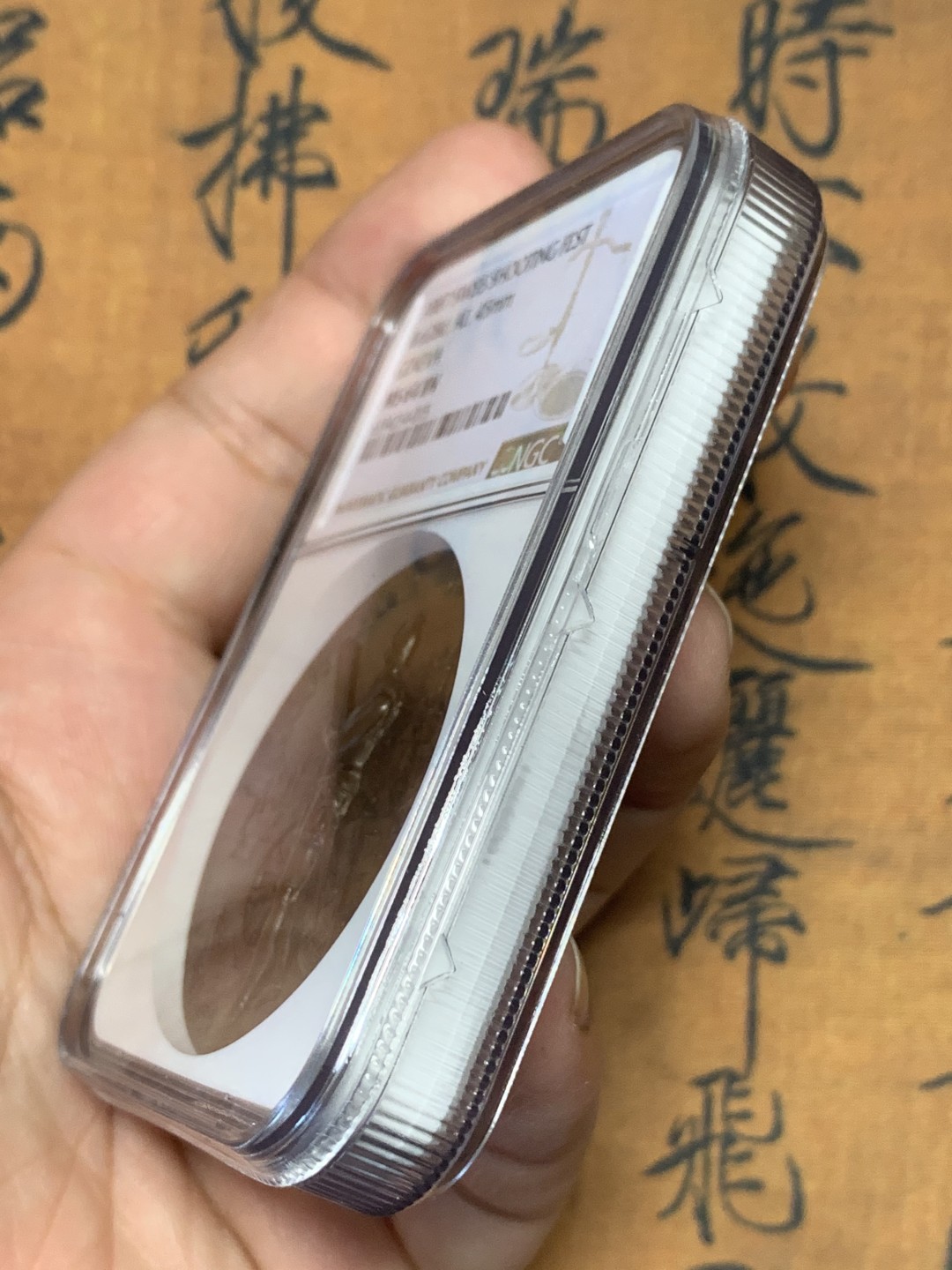 《竞宝斋》第111场-周日，周一 ，2场连拍（全场包邮） NGC MS64 高分 瑞士1887年 日内瓦射击节铜章高浮雕状态 加厚盒装  45mm 57.5克 巧克力包浆