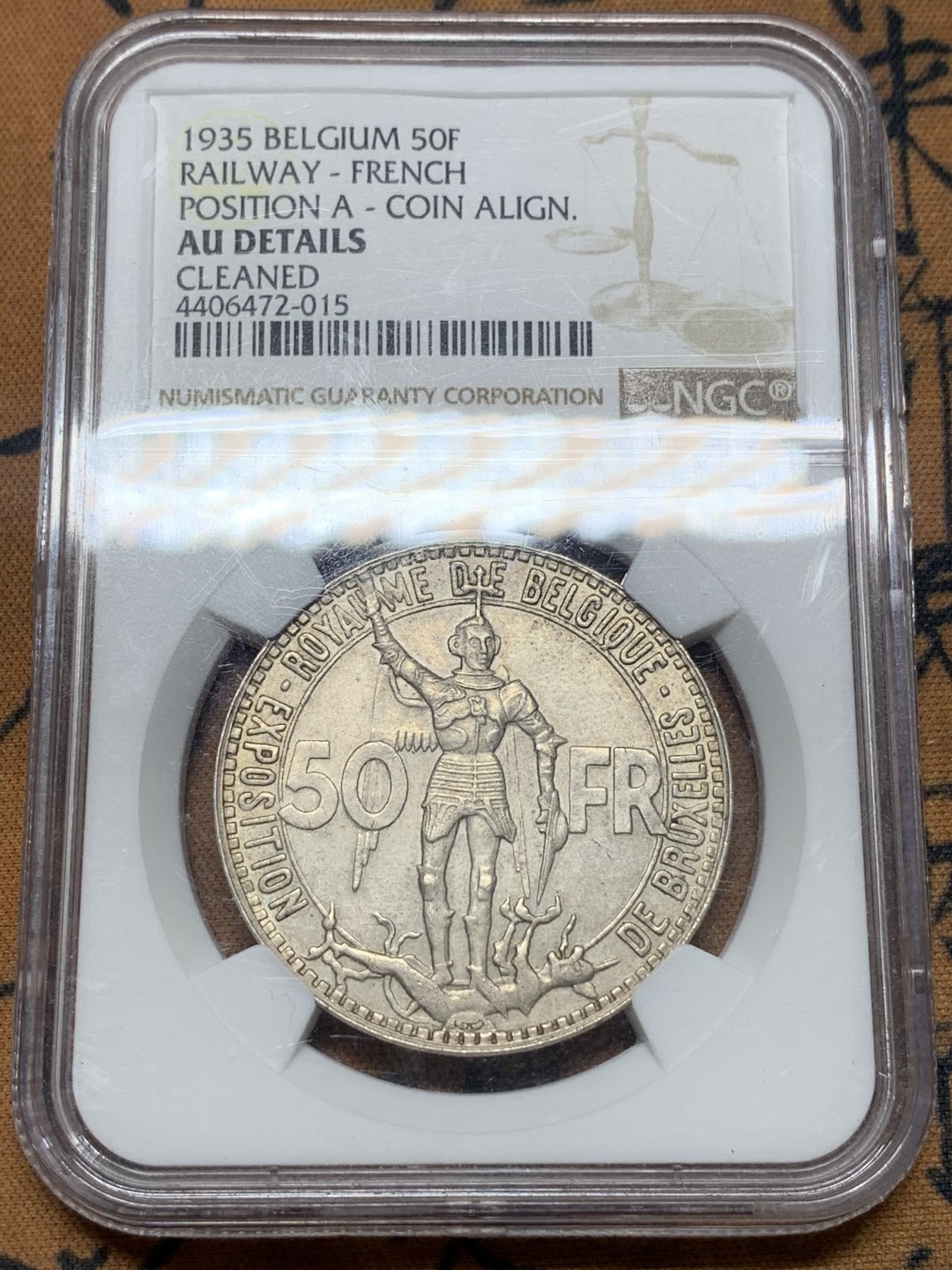 《竞宝斋》第111场-周日，周一 ，2场连拍（全场包邮） NGC AU评级 比利时 1935年 布鲁塞尔世博会 50法郎银币 原味包浆 细节很好，鼻尖无磨损给AU 不知道说什么了