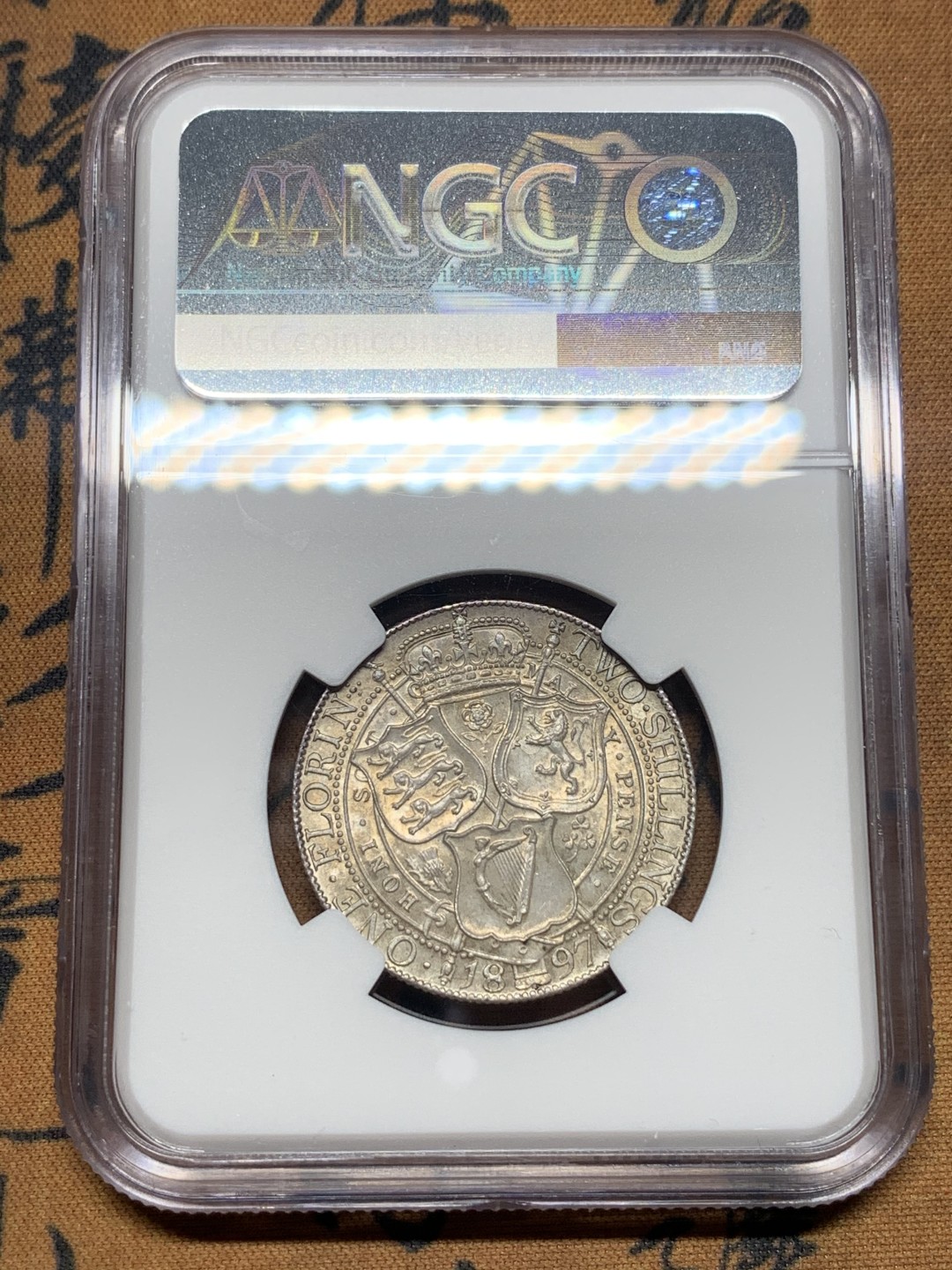 《竞宝斋》第111场-周日，周一 ，2场连拍（全场包邮） NGC MS63 英国 1897年 维多利亚 批纱版 1福林=2先令 银币 漂亮