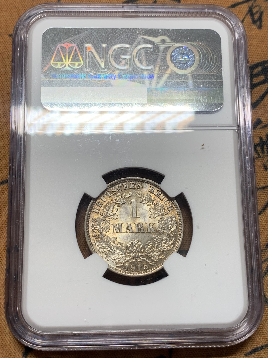 《竞宝斋》第111场-周日，周一 ，2场连拍（全场包邮） NGC-MS65 德国 1915E 长翅鹰1马克银币 黄油彩包浆