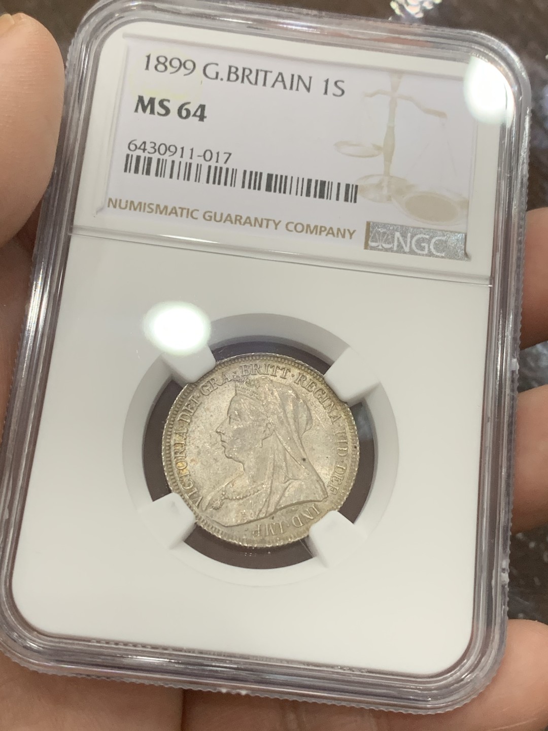 《竞宝斋》第111场-周日，周一 ，2场连拍（全场包邮） NGC MS64 英国 1899年 维多利亚 批纱版 1先令 银币 淡包浆 低评