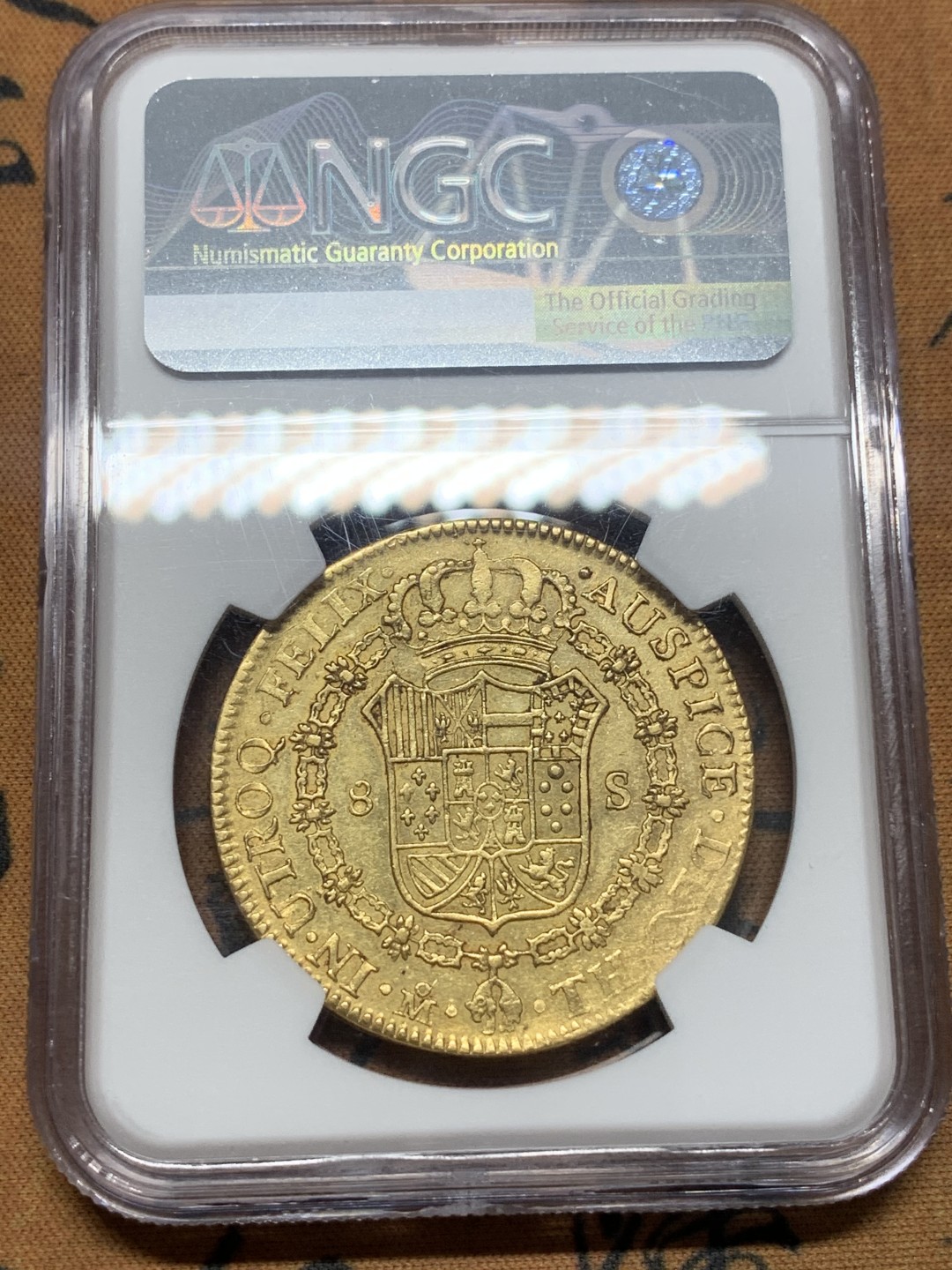 《竞宝斋》第111场-周日，周一 ，2场连拍（全场包邮） NGC-AU55 1807年西属墨西哥卡洛斯四世8埃斯库多金币 墨西哥的金币比哥伦比亚、智利、秘鲁都少见且昂贵，这枚币面干净没有铸缺 人物深打 难得