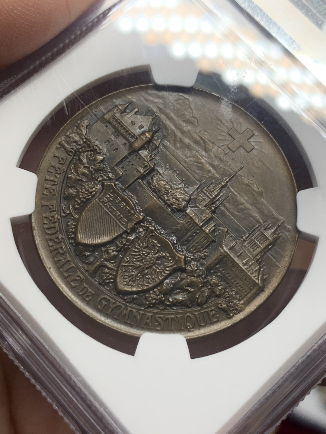 《竞宝斋》第111场-周日，周一 ，2场连拍（全场包邮） NGC MS64  1909年 瑞士洛桑  城市景观铜章 超燃品相