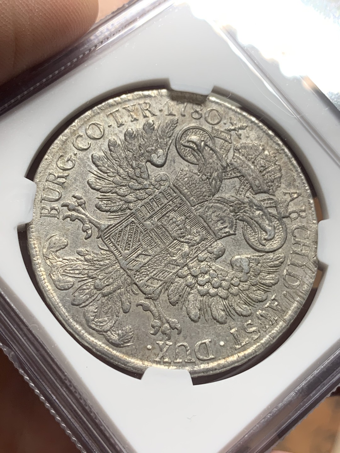 《竞宝斋》第111场-周日，周一 ，2场连拍（全场包邮） NGC-AUD 奥地利“1780年”特蕾莎1泰勒银币 1817-1833年铸造 威尼斯 对应目录编号应该是37a N就给了早期后铸缺失精准