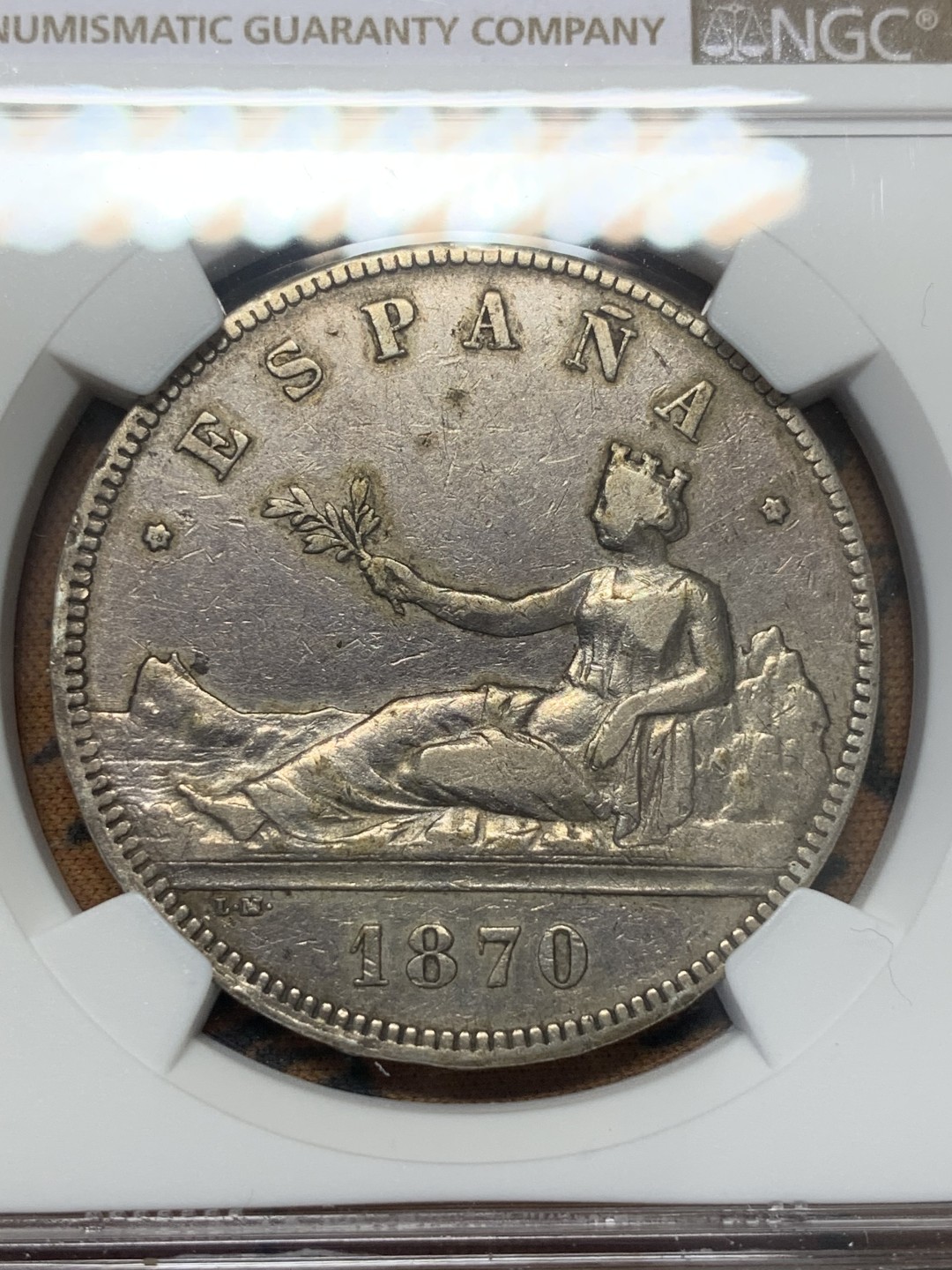 《竞宝斋》第111场-周日，周一 ，2场连拍（全场包邮） NGC XF40 西班牙 1870年 坐人拿花 5比塞塔 银币 原味包浆 细节好