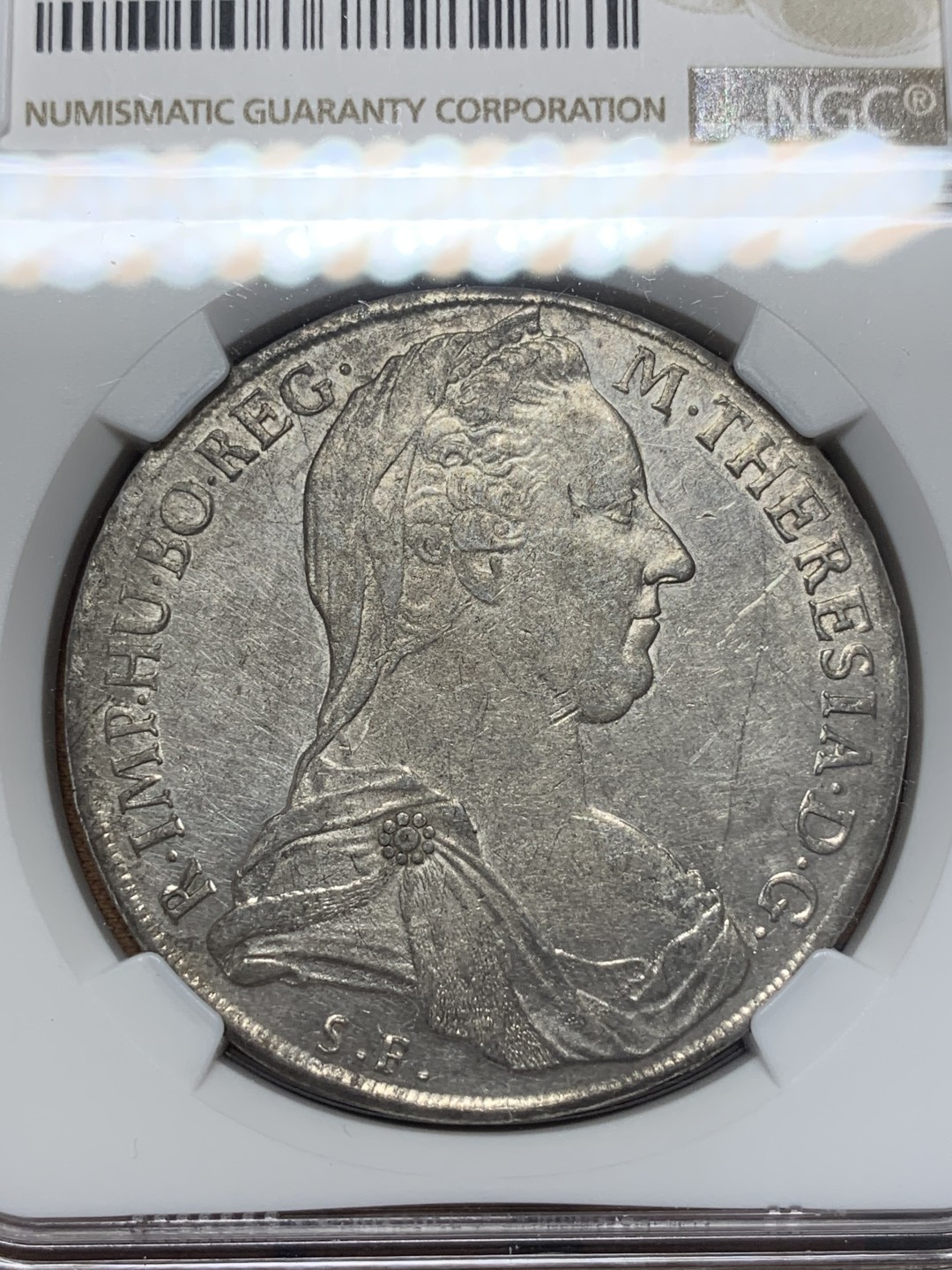 《竞宝斋》第111场-周日，周一 ，2场连拍（全场包邮） NGC-AUD 奥地利“1780年”特蕾莎1泰勒银币 1817-1833年铸造 威尼斯 对应目录编号应该是37a N就给了早期后铸缺失精准
