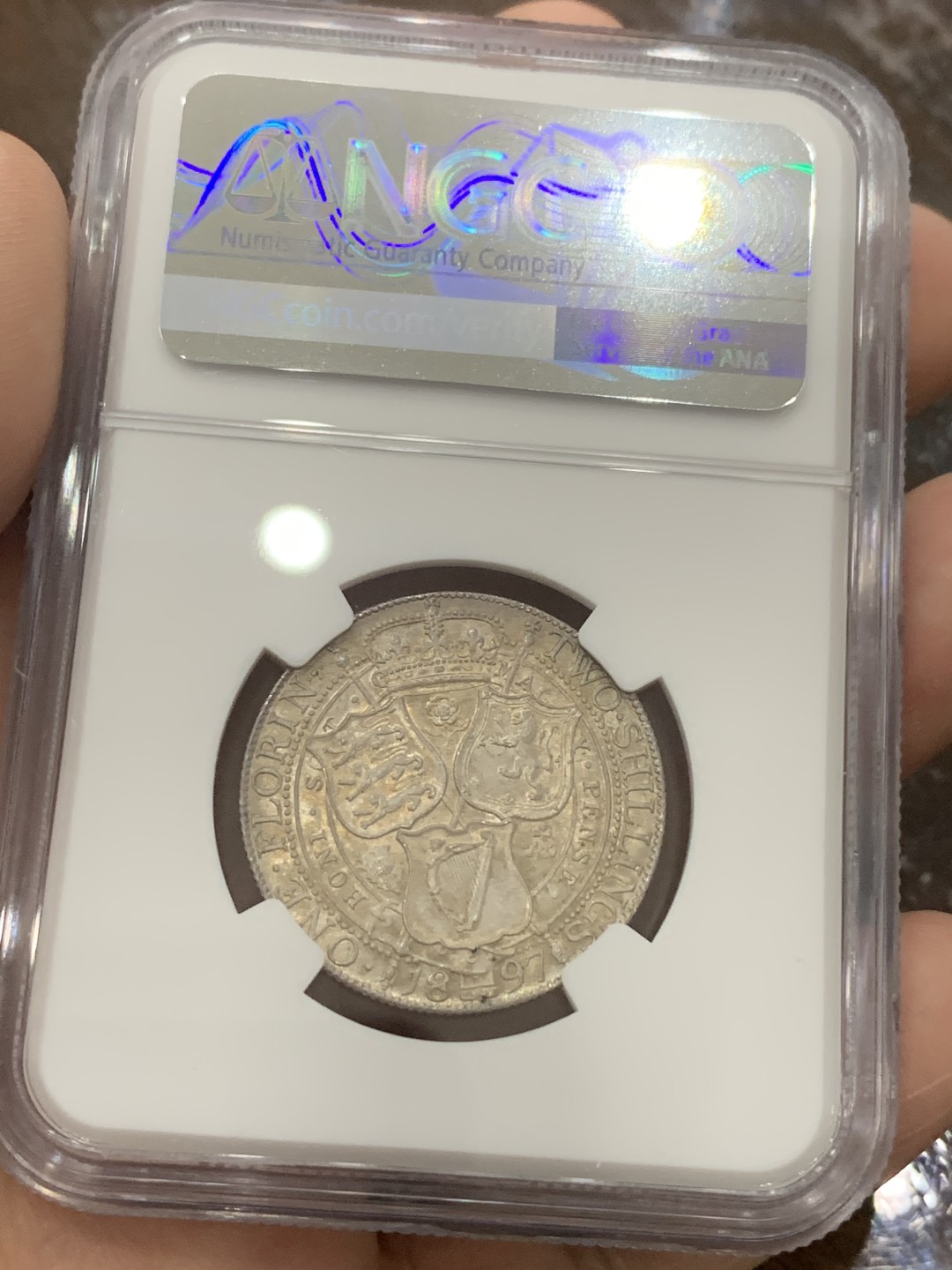 《竞宝斋》第111场-周日，周一 ，2场连拍（全场包邮） NGC MS63 英国 1897年 维多利亚 批纱版 1福林=2先令 银币 漂亮