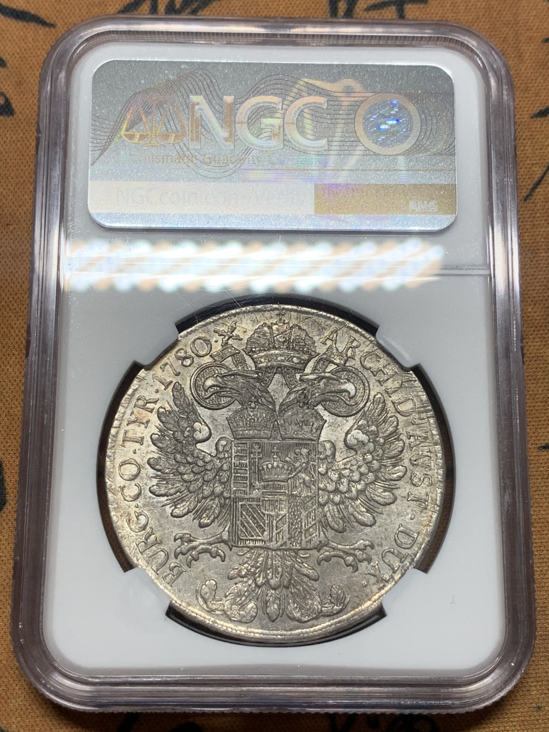 《竞宝斋》第111场-周日，周一 ，2场连拍（全场包邮） NGC-AUD 奥地利“1780年”特蕾莎1泰勒银币 1817-1833年铸造 威尼斯 对应目录编号应该是37a N就给了早期后铸缺失精准