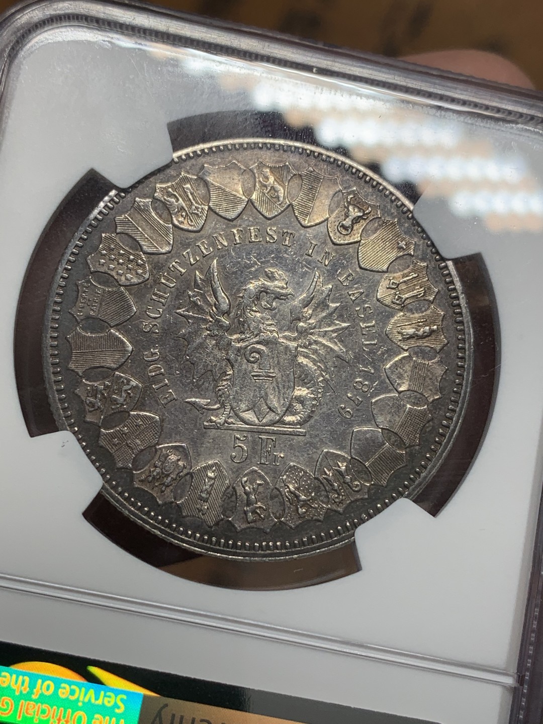 《竞宝斋》第111场-周日，周一 ，2场连拍（全场包邮） NGC AU 1879年瑞士巴塞尔射击节5法郎银币  包浆醇美 几乎也没多少磨损