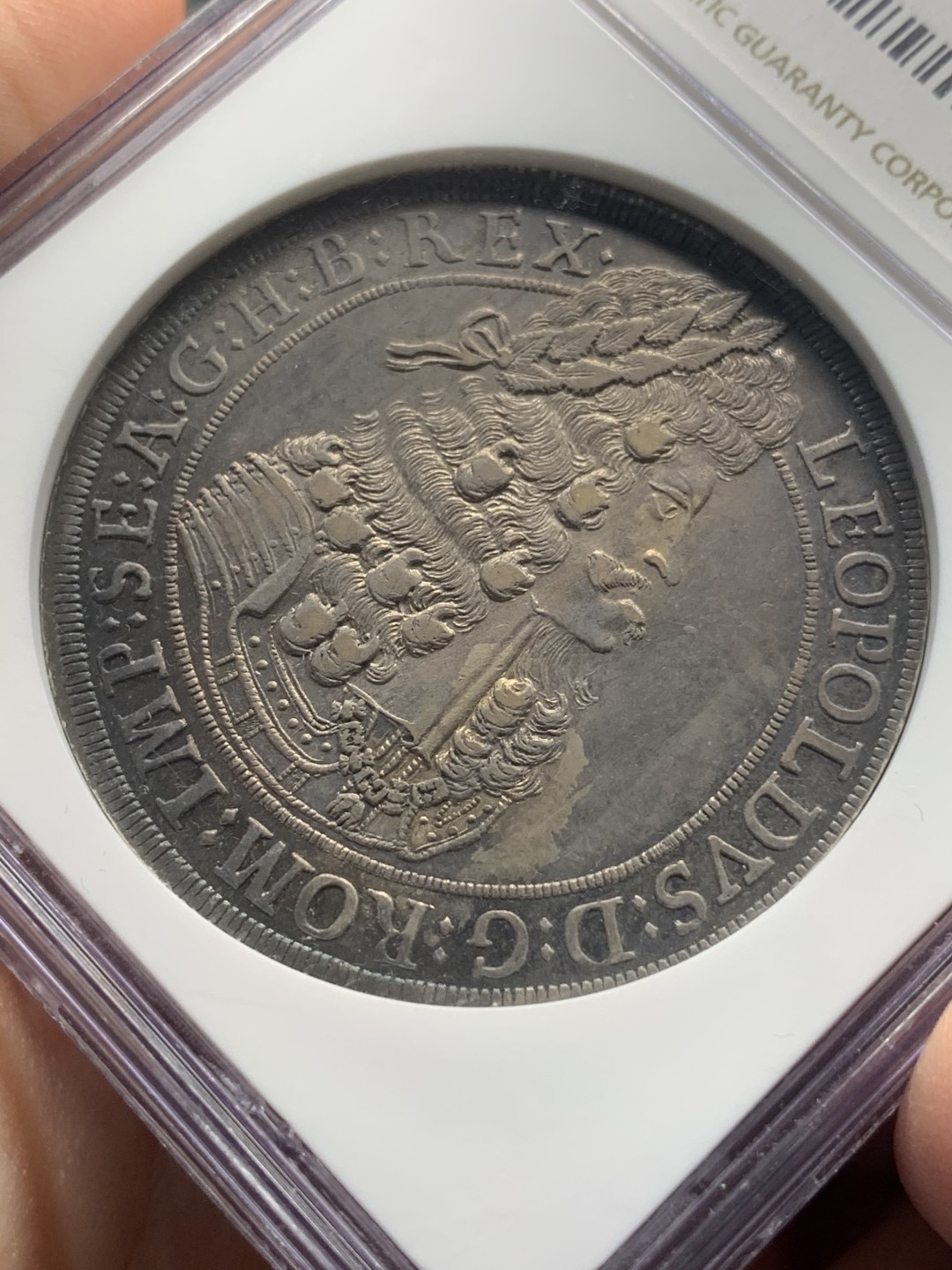 《竞宝斋》第111场-周日，周一 ，2场连拍（全场包邮） NGC-AU58  神圣罗马 帝国 1701年 利奥波德一世 大波浪 猪嘴大泰勒银币 入骨五彩包浆 老味道 非常漂亮