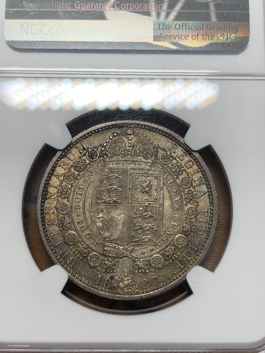 《竞宝斋》第111场-周日，周一 ，2场连拍（全场包邮） NGC-MS63 1887年 英国维多利亚高冠半克朗银币 重彩包浆 底板好 非常漂亮的一颗