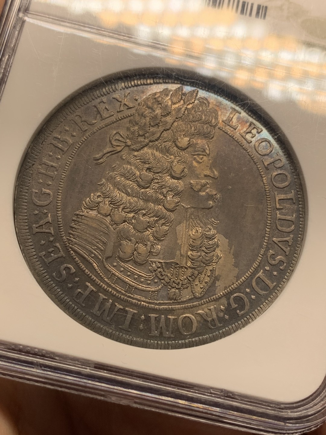 《竞宝斋》第111场-周日，周一 ，2场连拍（全场包邮） NGC-AU58  神圣罗马 帝国 1701年 利奥波德一世 大波浪 猪嘴大泰勒银币 入骨五彩包浆 老味道 非常漂亮