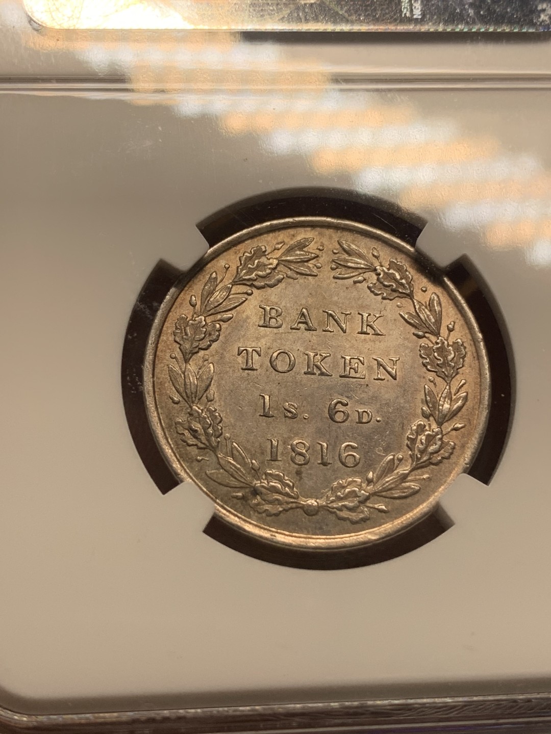 《竞宝斋》第111场-周日，周一 ，2场连拍（全场包邮） NGC MS62 英国乔三 英格兰银行1816 1先令6便士  状态一流