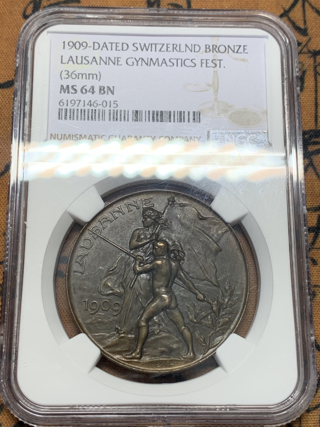 《竞宝斋》第111场-周日，周一 ，2场连拍（全场包邮） NGC MS64  1909年 瑞士洛桑  城市景观铜章 超燃品相