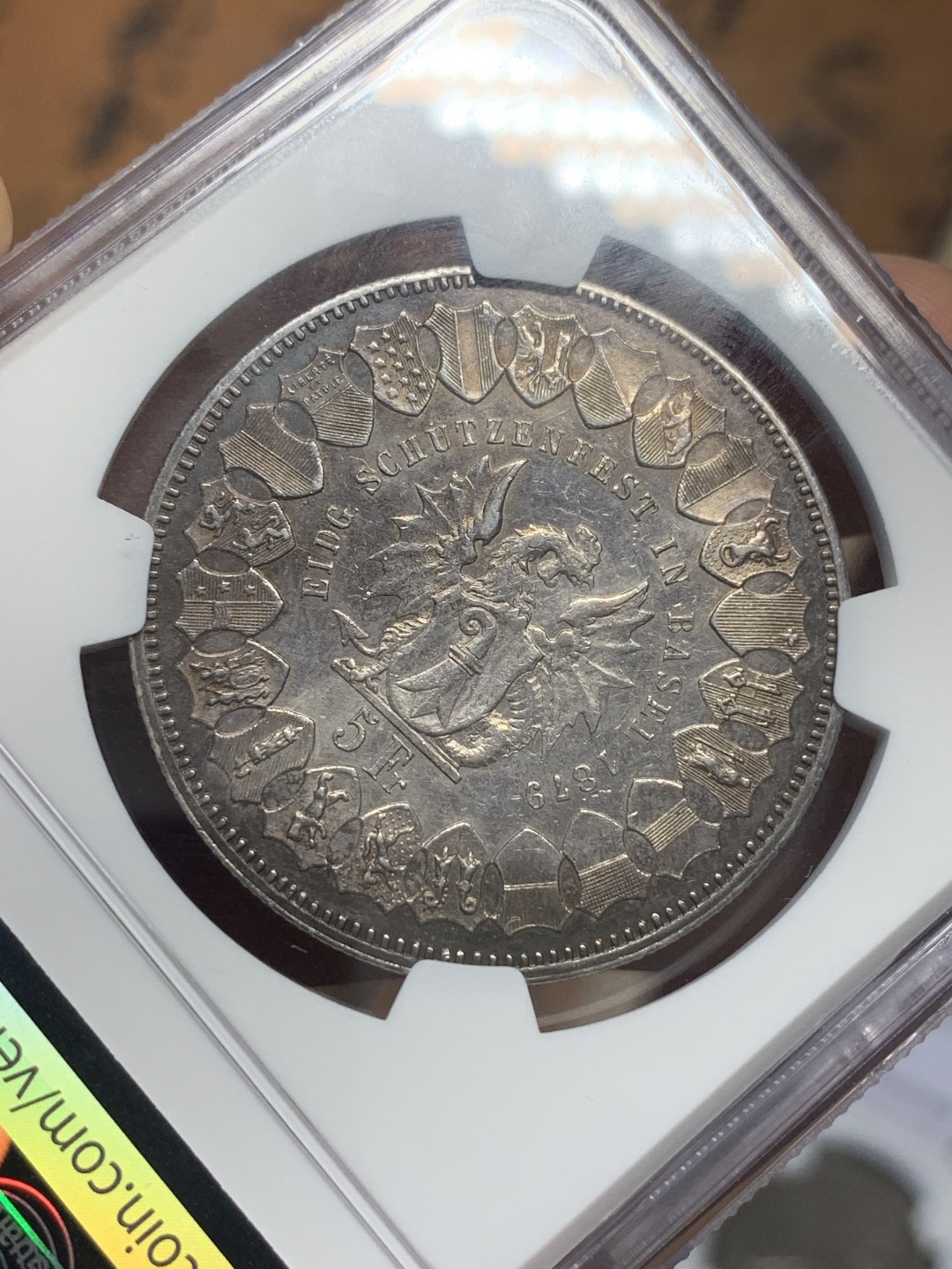 《竞宝斋》第111场-周日，周一 ，2场连拍（全场包邮） NGC AU 1879年瑞士巴塞尔射击节5法郎银币  包浆醇美 几乎也没多少磨损