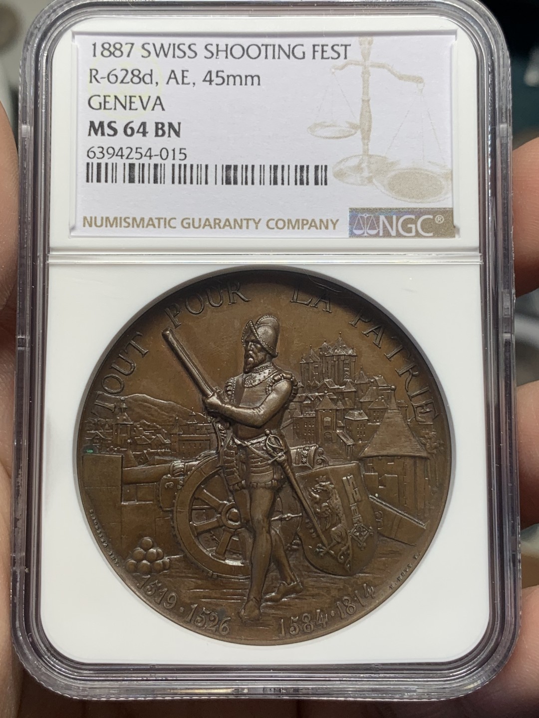 《竞宝斋》第111场-周日，周一 ，2场连拍（全场包邮） NGC MS64 高分 瑞士1887年 日内瓦射击节铜章高浮雕状态 加厚盒装  45mm 57.5克 巧克力包浆