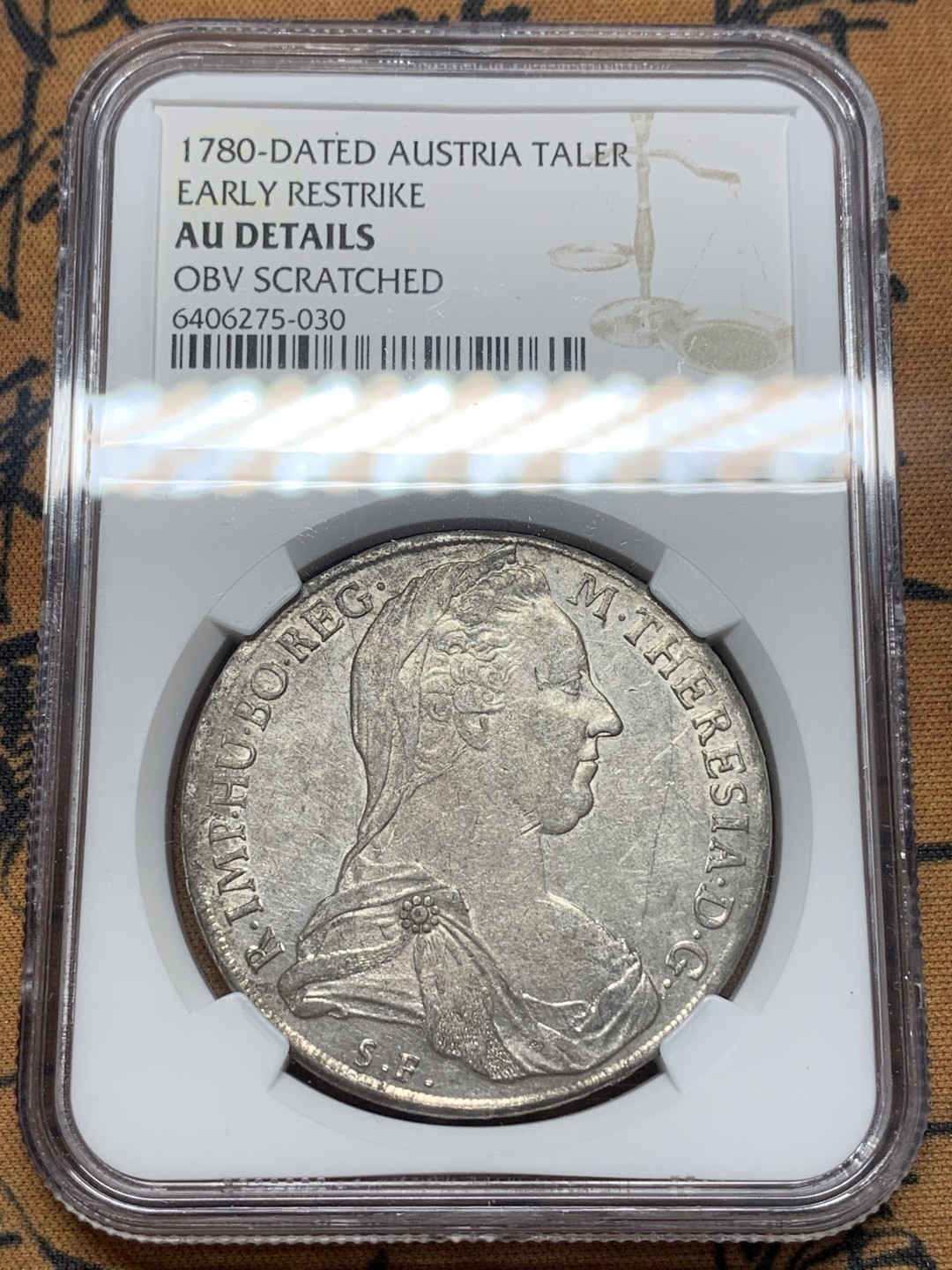 《竞宝斋》第111场-周日，周一 ，2场连拍（全场包邮） NGC-AUD 奥地利“1780年”特蕾莎1泰勒银币 1817-1833年铸造 威尼斯 对应目录编号应该是37a N就给了早期后铸缺失精准
