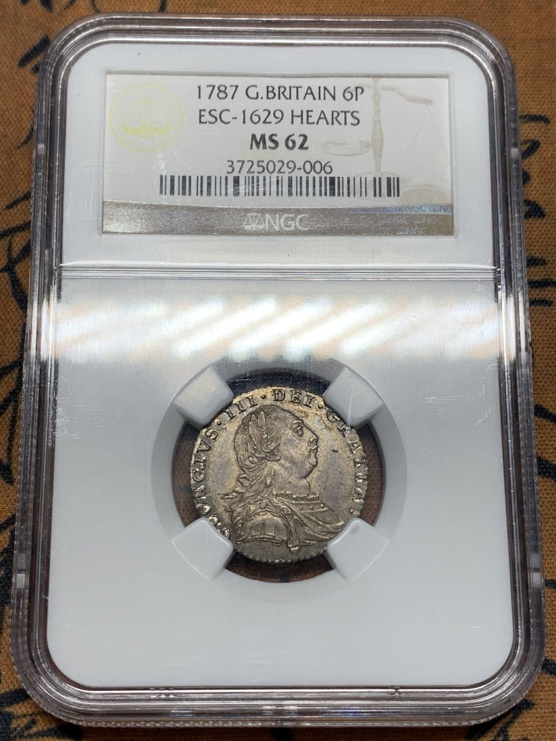 《竞宝斋》第112场-周日，周一 ，2场连拍（全场包邮） NGC MS62  英国乔三 1787 6便士 有心版 深彩包浆 老盒评级
