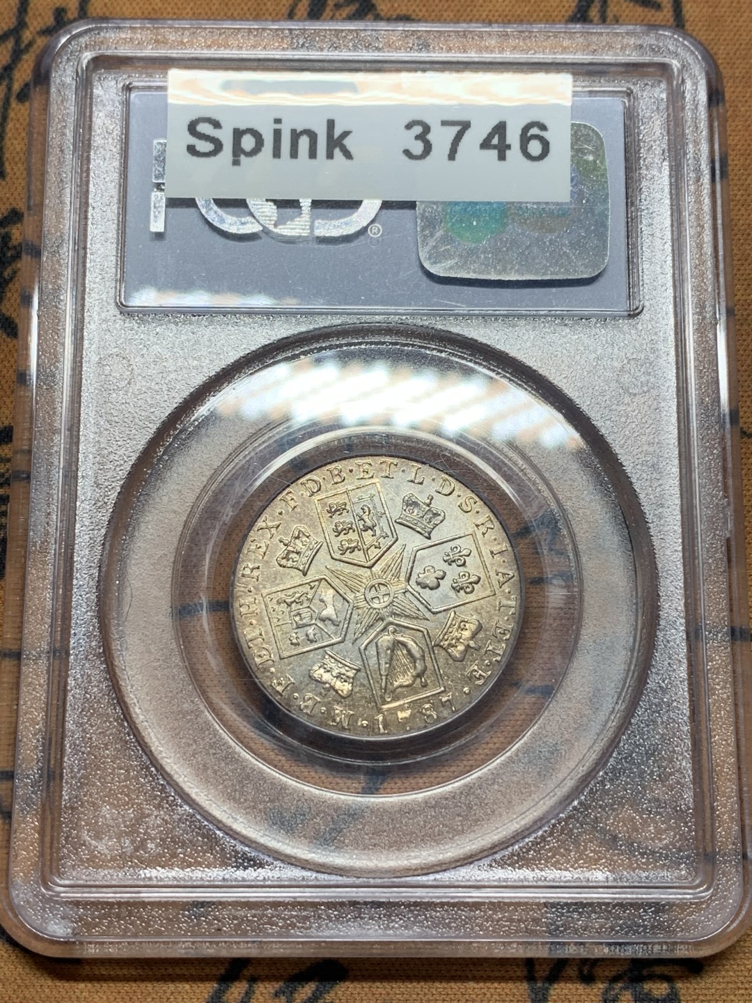 《竞宝斋》第112场-周日，周一 ，2场连拍（全场包邮） PCGS MS62 英国乔三 1787 一先令 有心版 老盒评级淡彩包浆