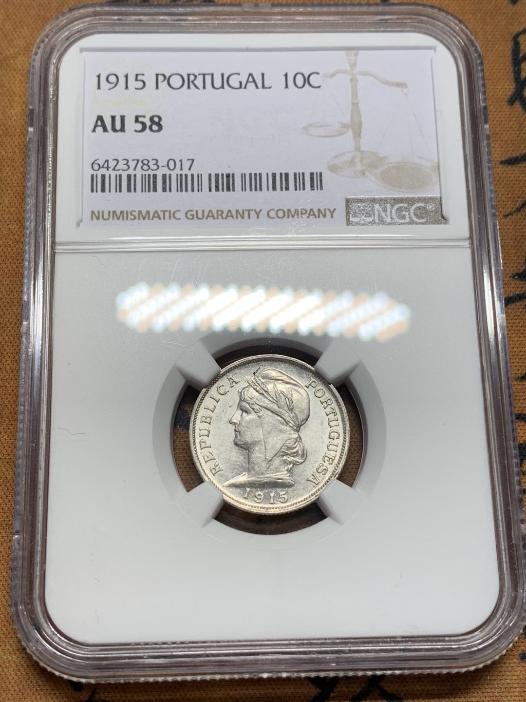 《竞宝斋》第112场-周日，周一 ，2场连拍（全场包邮） NGC-AU58 葡萄牙1915年 自由女神头像 10分银币 原光好品