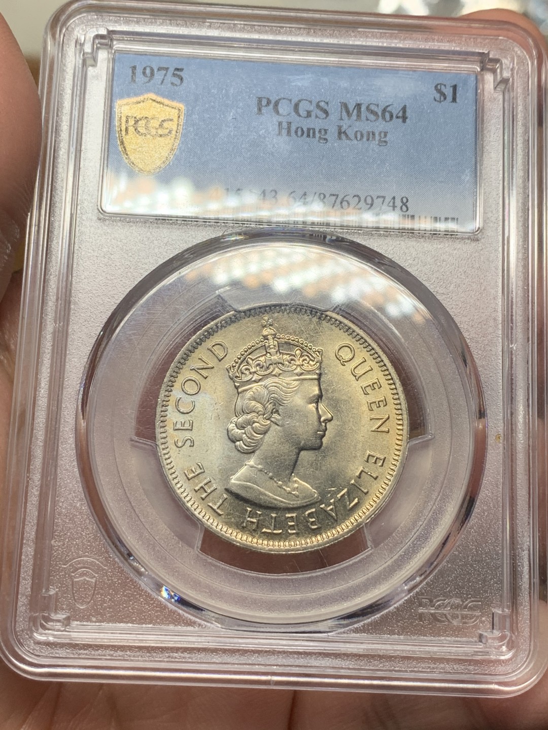 《竞宝斋》第112场-周日，周一 ，2场连拍（全场包邮） PCGS MS64 香港 1975年 伊丽莎白二世大一元 港币