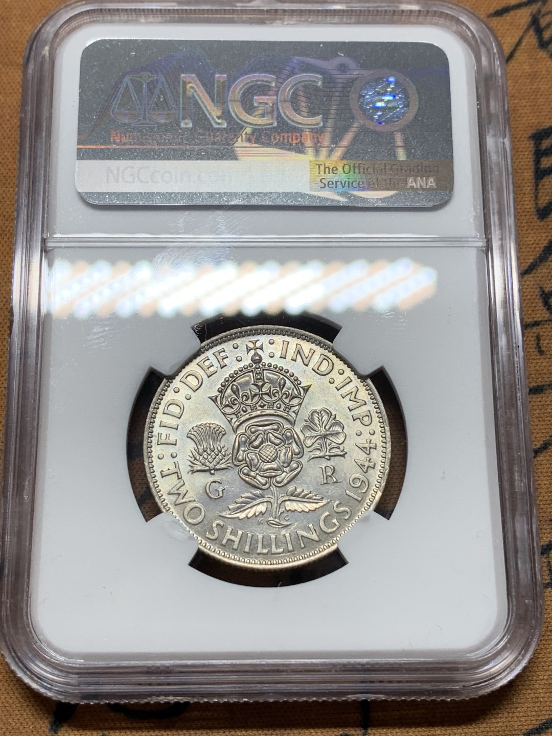 《竞宝斋》第112场-周日，周一 ，2场连拍（全场包邮） NGC-AU55 英国1944年 乔六2先令银币 原光好品