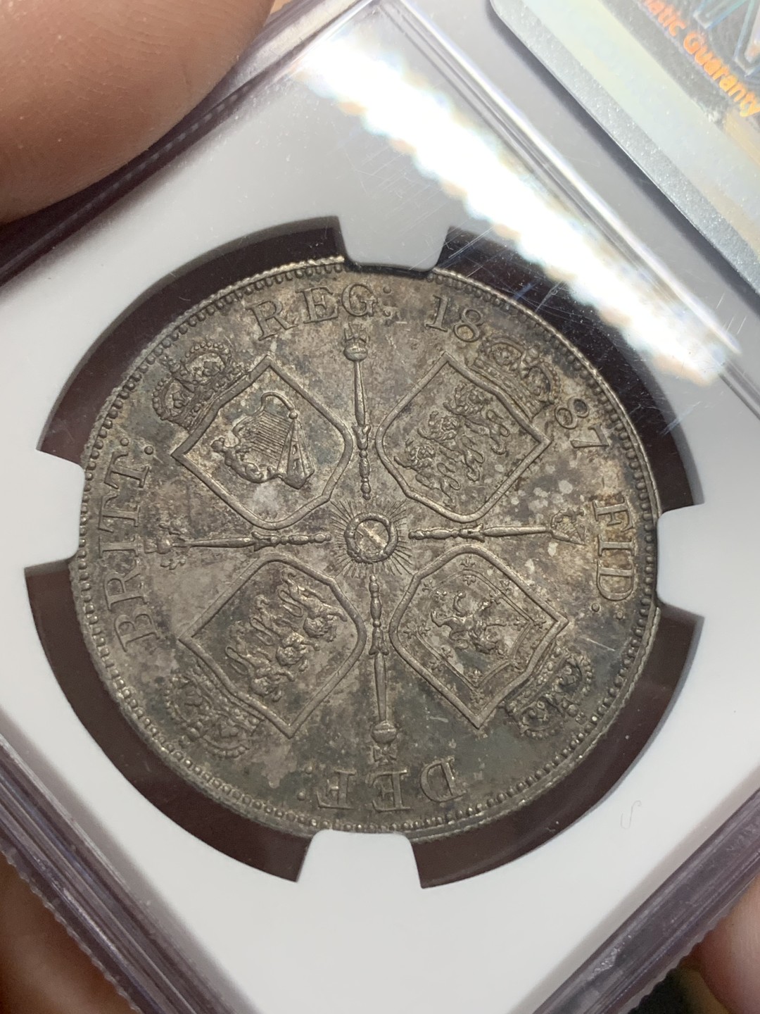 《竞宝斋》第112场-周日，周一 ，2场连拍（全场包邮） NGC MS62 英国 1887年 维多利亚 高冠 双福林 银币 深彩包浆 底板非常好