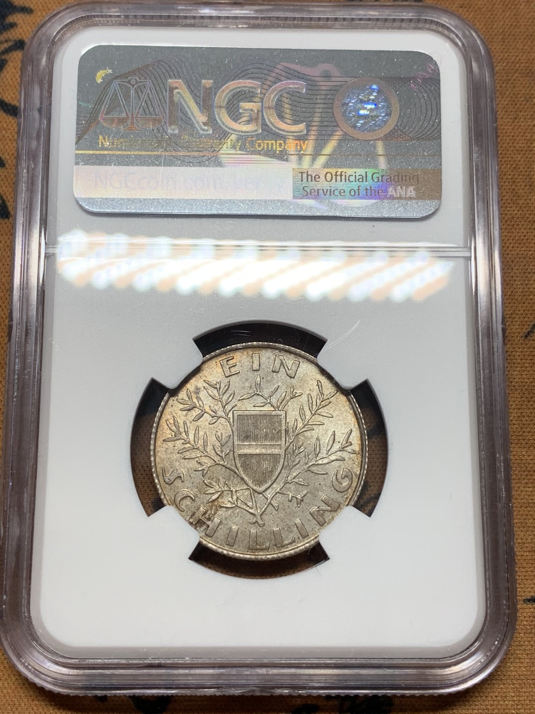 《竞宝斋》第112场-周日，周一 ，2场连拍（全场包邮） 第三名 NGC-MS64 奥地利1924年 维也纳会议大厅 1先令银币 带点月牙彩 非常漂亮