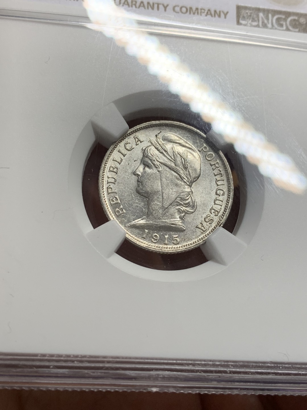 《竞宝斋》第112场-周日，周一 ，2场连拍（全场包邮） NGC-AU58 葡萄牙1915年 自由女神头像 10分银币 原光好品