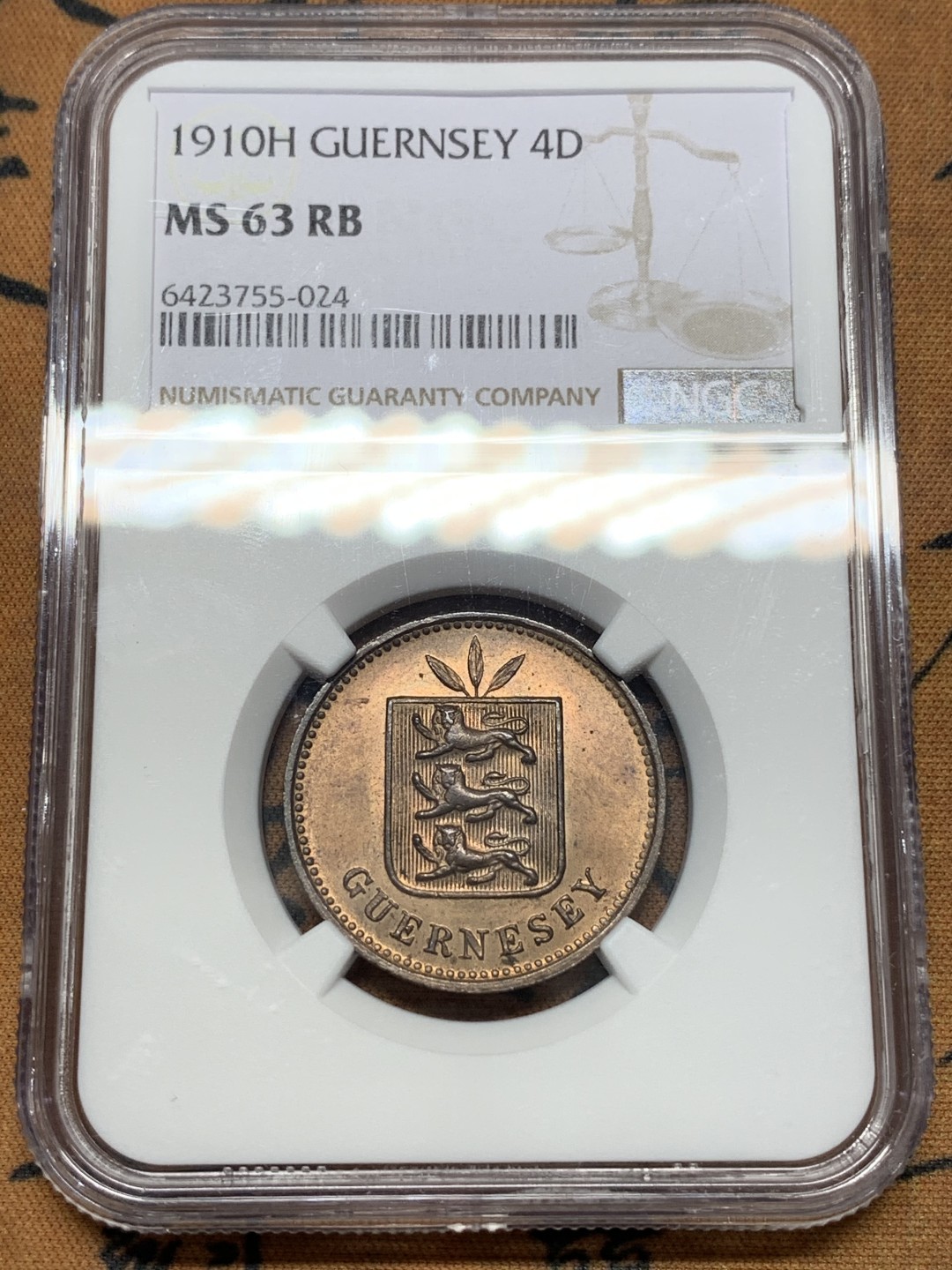 《竞宝斋》第112场-周日，周一 ，2场连拍（全场包邮） NGC MS63 RB英属格恩济1910H4道布 更高分仅三枚