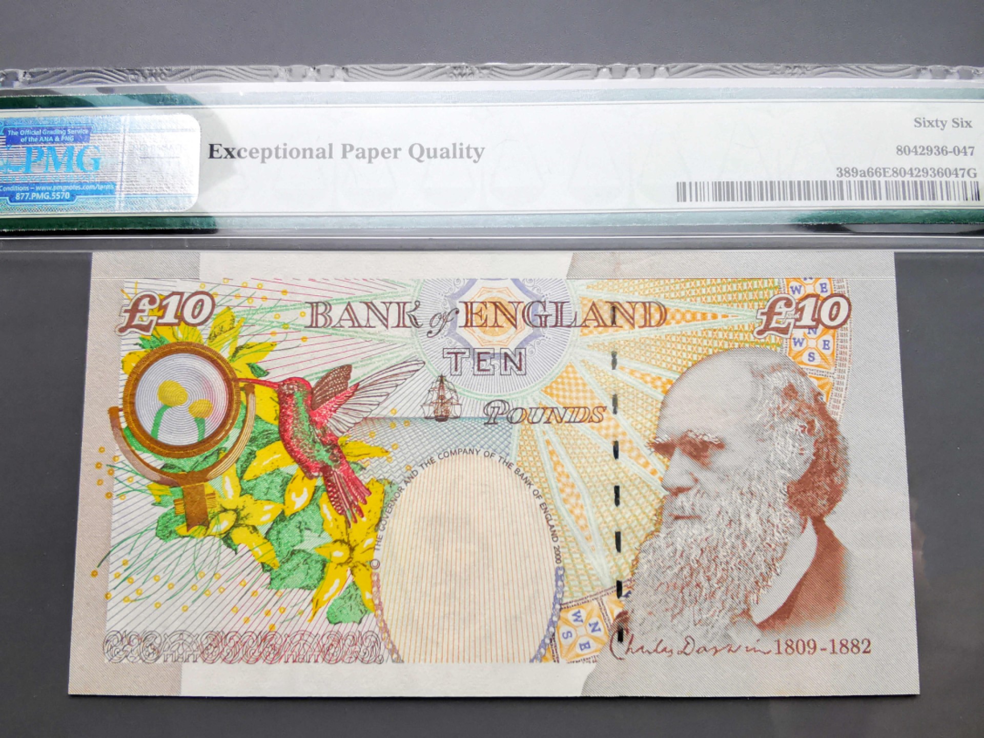 《崇甫堂》-英国纸钞PMG评级专场IV 英国 2000年 错印THE AA01首发字冠 千位小号 Pick:389a PMG-66 E序列再版10镑 达尔文