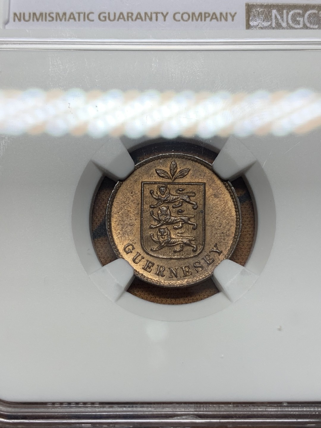 《竞宝斋》第112场-周日，周一 ，2场连拍（全场包邮） NGC MS64 RB英属格恩济1902H1道布 季军分级 光泽细腻