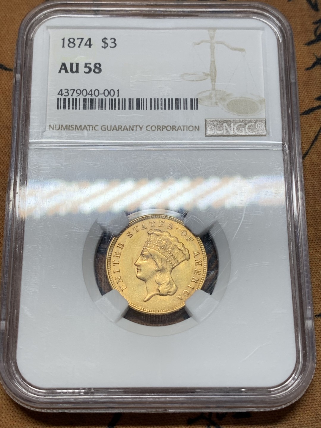 《竞宝斋》第112场-周日，周一 ，2场连拍（全场包邮） NGC-AU58 美国印第安公主 1874年20周年 3美金金币 20.5mm 5.015克 900金 多数在美国内战及罗斯福二战等被多次熔炉 存世量极少 该枚低评