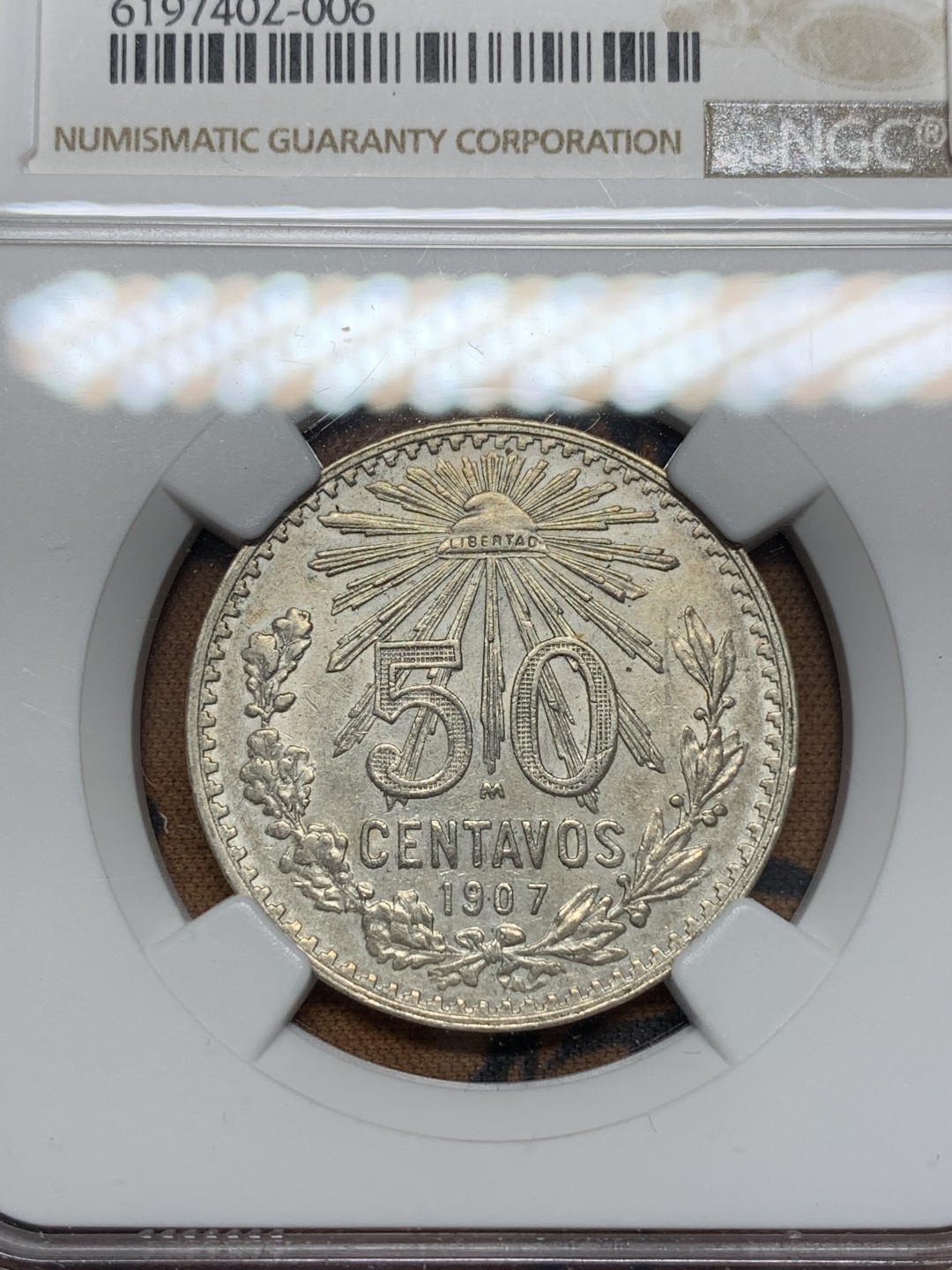 《竞宝斋》第112场-周日，周一 ，2场连拍（全场包邮） NGC-AU58 1907M NGC季军分，墨西哥50分银币 经典墨西哥鹰洋 此版早期年份，不是后期三四十年代的版本，高分稀见