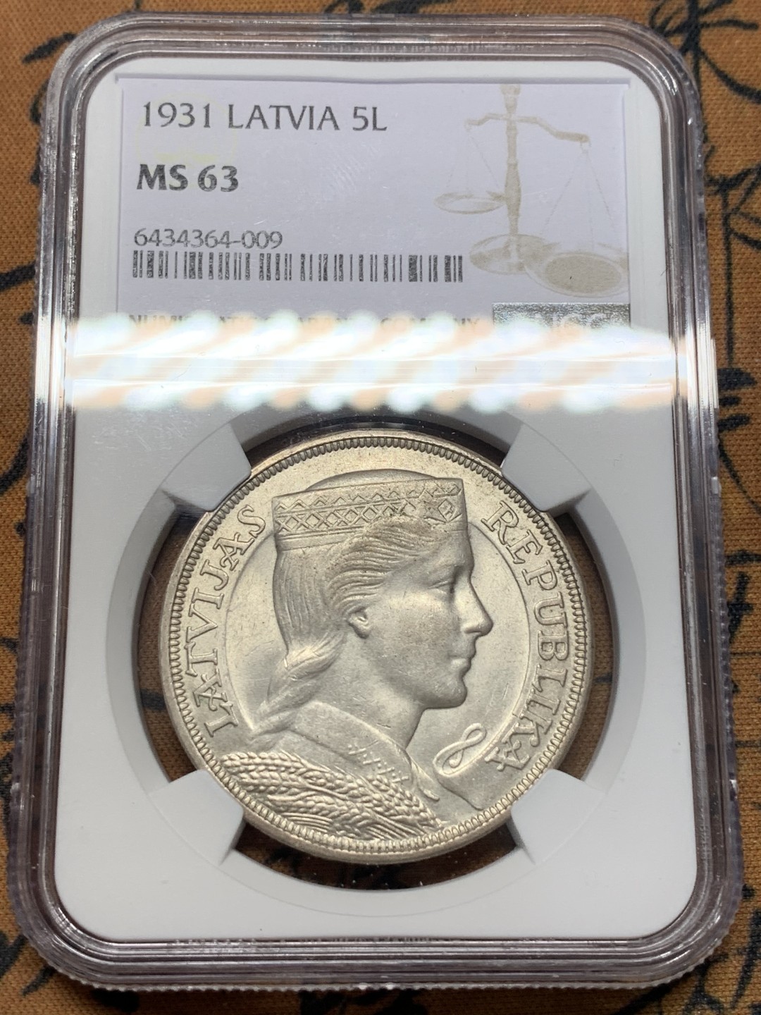 《竞宝斋》第112场-周日，周一 ，2场连拍（全场包邮） NGC-MS63 拉脱维亚1931年少女头像5拉特银币 大热品种 外拍价格已起飞