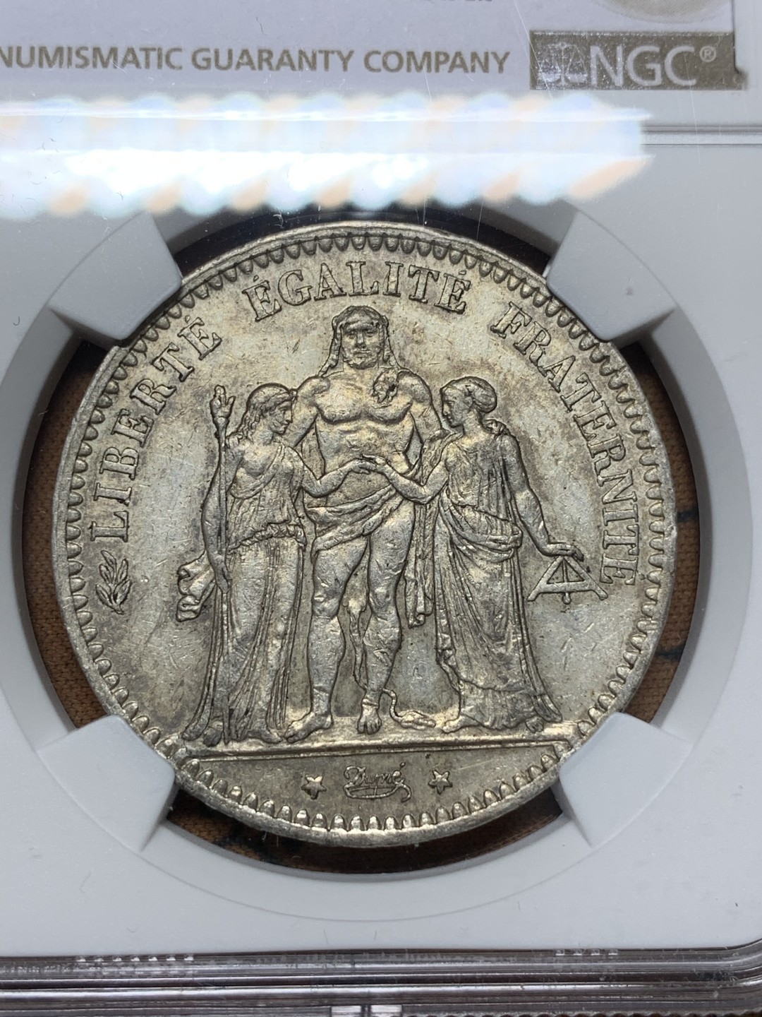 《竞宝斋》第112场-周日，周一 ，2场连拍（全场包邮） NGC-AU55 法国1876年大力神 5法郎大银币 带彩包浆 非常漂亮