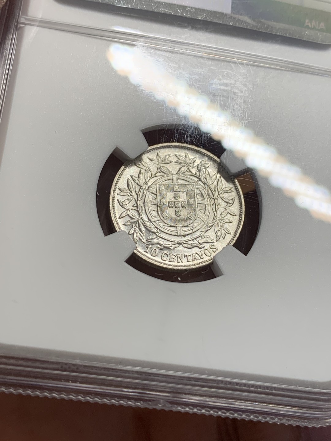 《竞宝斋》第112场-周日，周一 ，2场连拍（全场包邮） NGC-AU58 葡萄牙1915年 自由女神头像 10分银币 原光好品