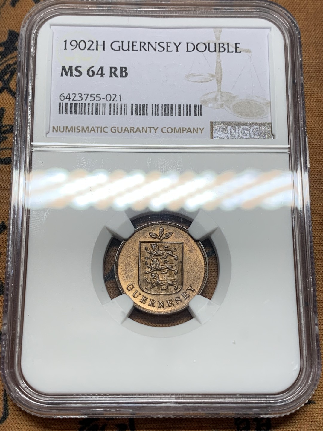 《竞宝斋》第112场-周日，周一 ，2场连拍（全场包邮） NGC MS64 RB英属格恩济1902H1道布 季军分级 光泽细腻