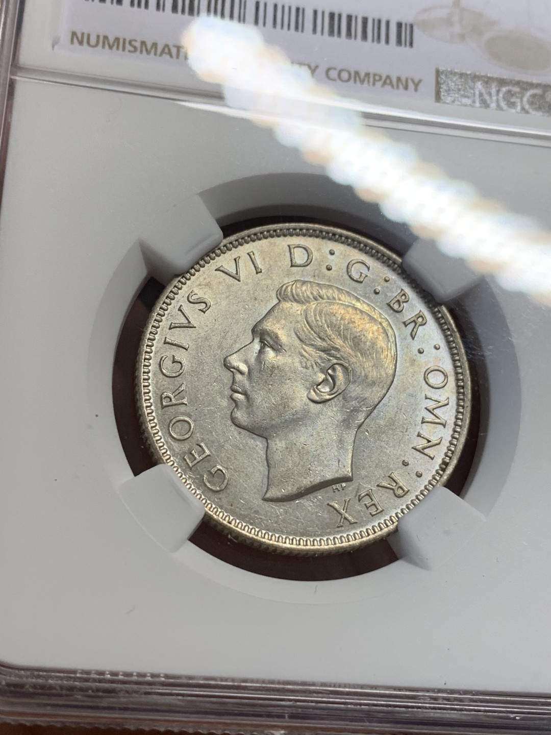 《竞宝斋》第112场-周日，周一 ，2场连拍（全场包邮） NGC-AU55 英国1944年 乔六2先令银币 原光好品