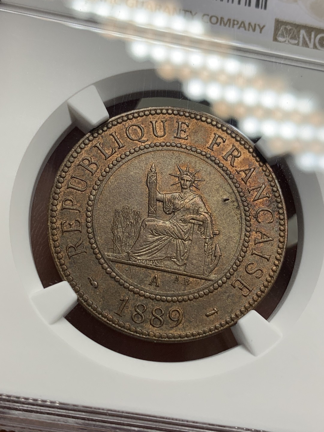 《竞宝斋》第112场-周日，周一 ，2场连拍（全场包邮） NGC AU58 BN 法属印度支那1889年百分之一 铜币      