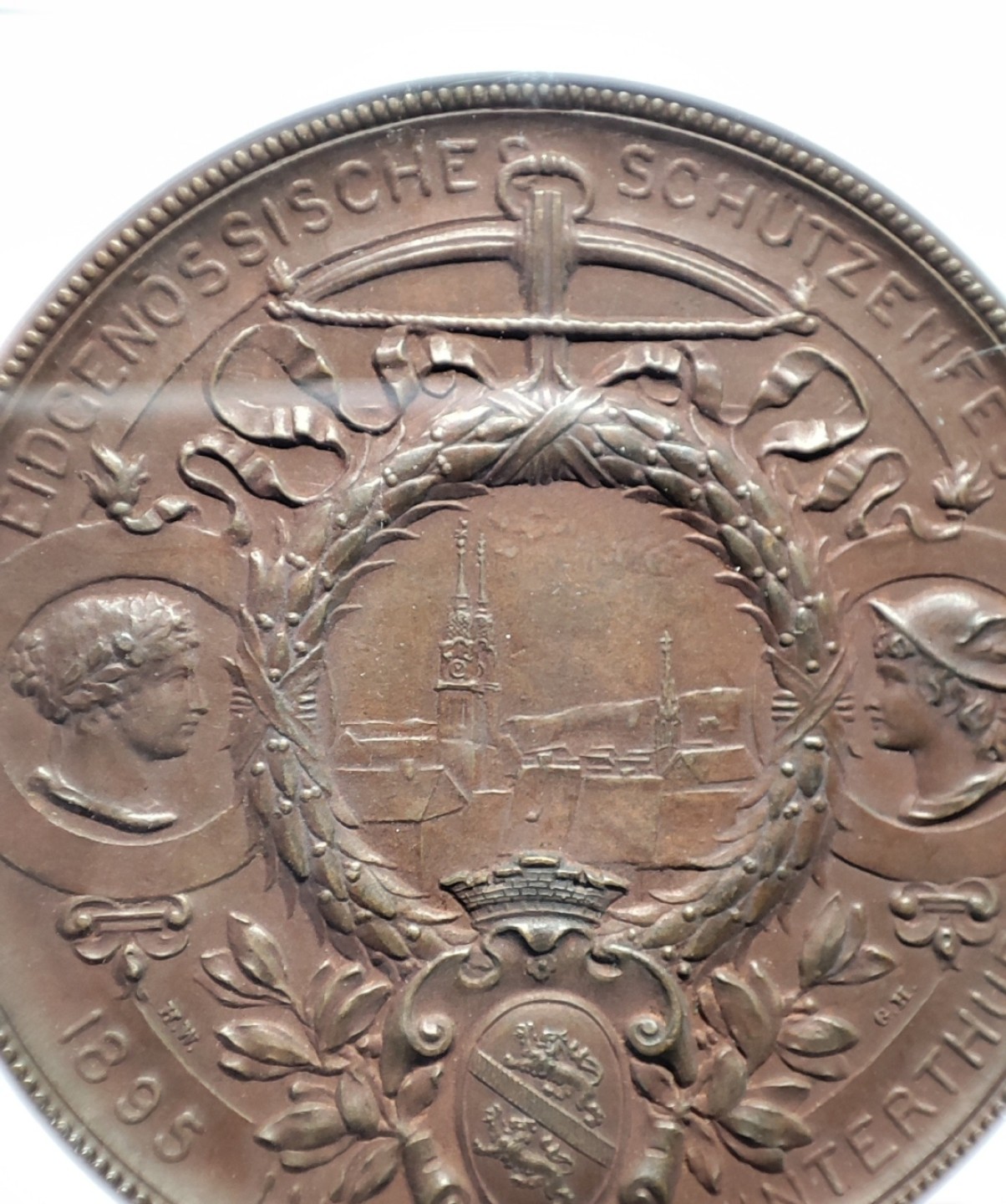 八角银章NGC章牌特卖会 瑞士1895射击节拿花女神铜章