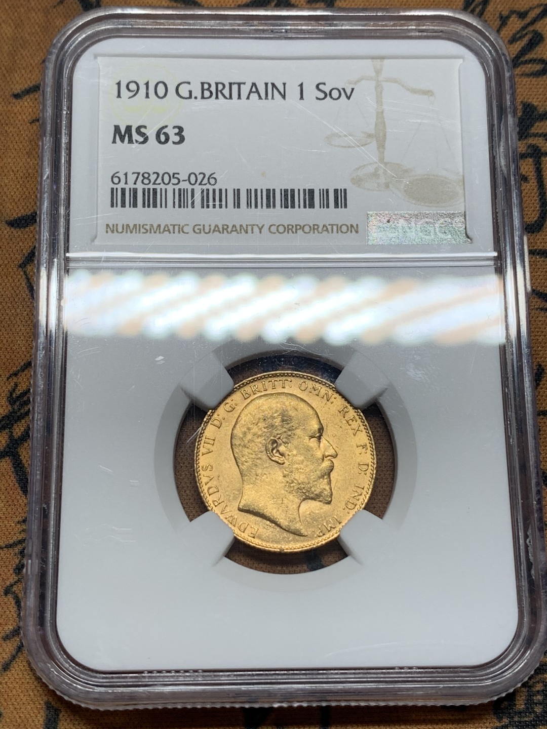 《竞宝斋》第112场-周日，周一 ，2场连拍（全场包邮） NGC-MS63 英国爱德华七世 1910年 1索维林马剑金币 8克 细节底板超分数状态