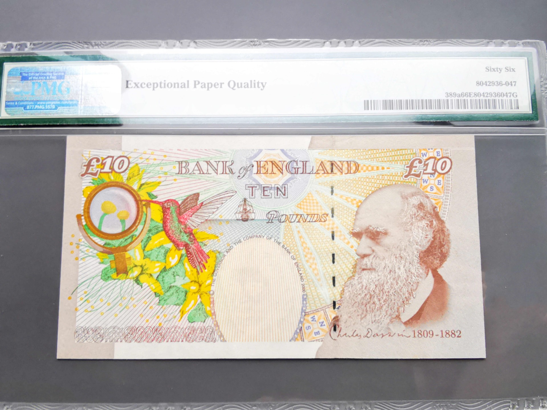《崇甫堂》-英国纸钞PMG评级专场IV 英国 2000年 错印THE AA01首发字冠 千位小号 Pick:389a PMG-66 E序列再版10镑 达尔文